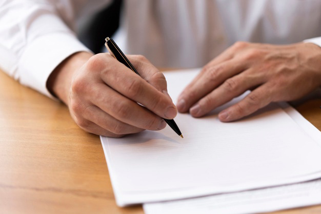 corporate man writing on blank paper 23 2148377799